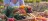 The cover of the Thematic Report: ''Assessment of the sectoral support withing the CAP' showing a woman with a basket of fruits and vegetables